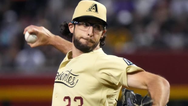 Diamondbacks pitcher Zac Gallen throws a pitch in a game.